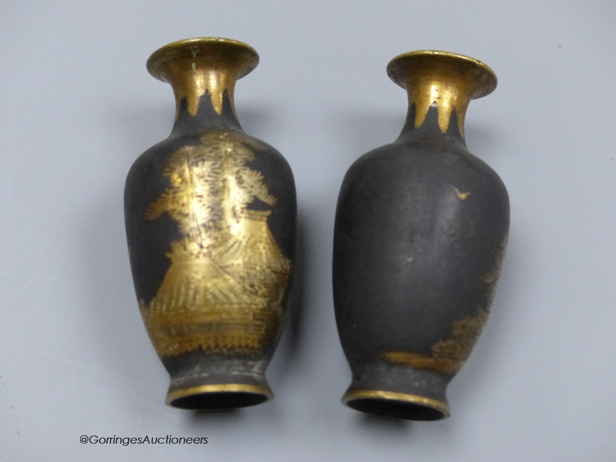 A pair of Japanese Komai style damascened iron miniature vases, height 6cm